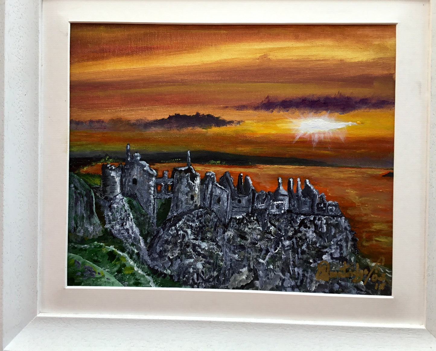 Dunluce Castle looking west at sunset